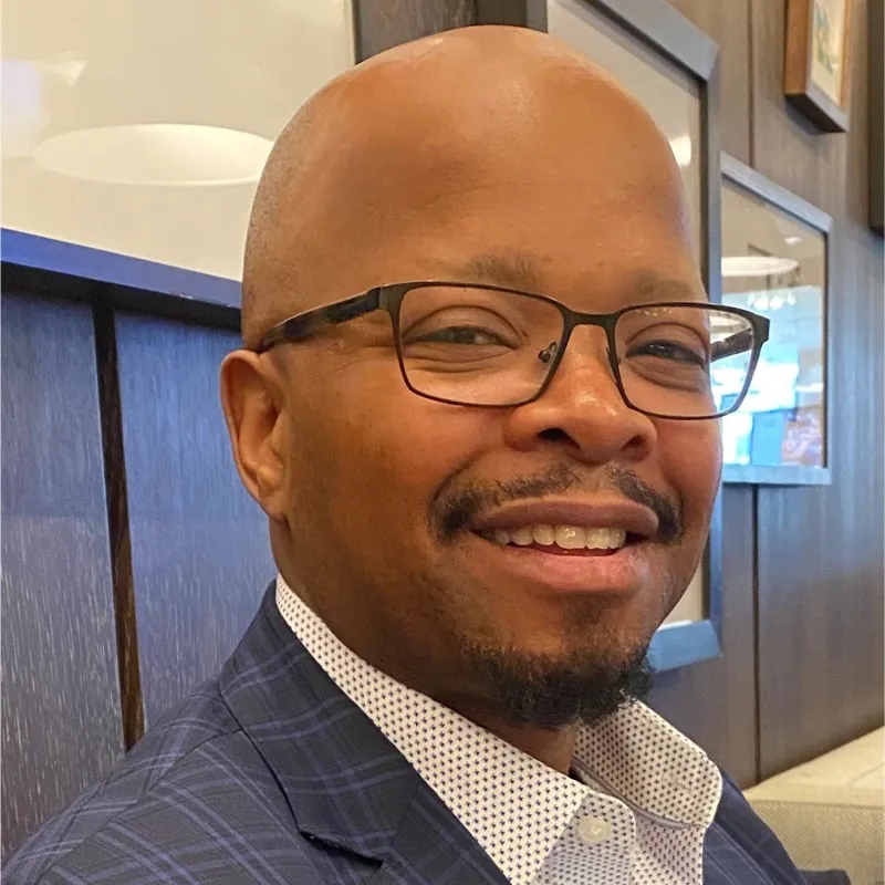Michael Booi, Chief Operating Officer